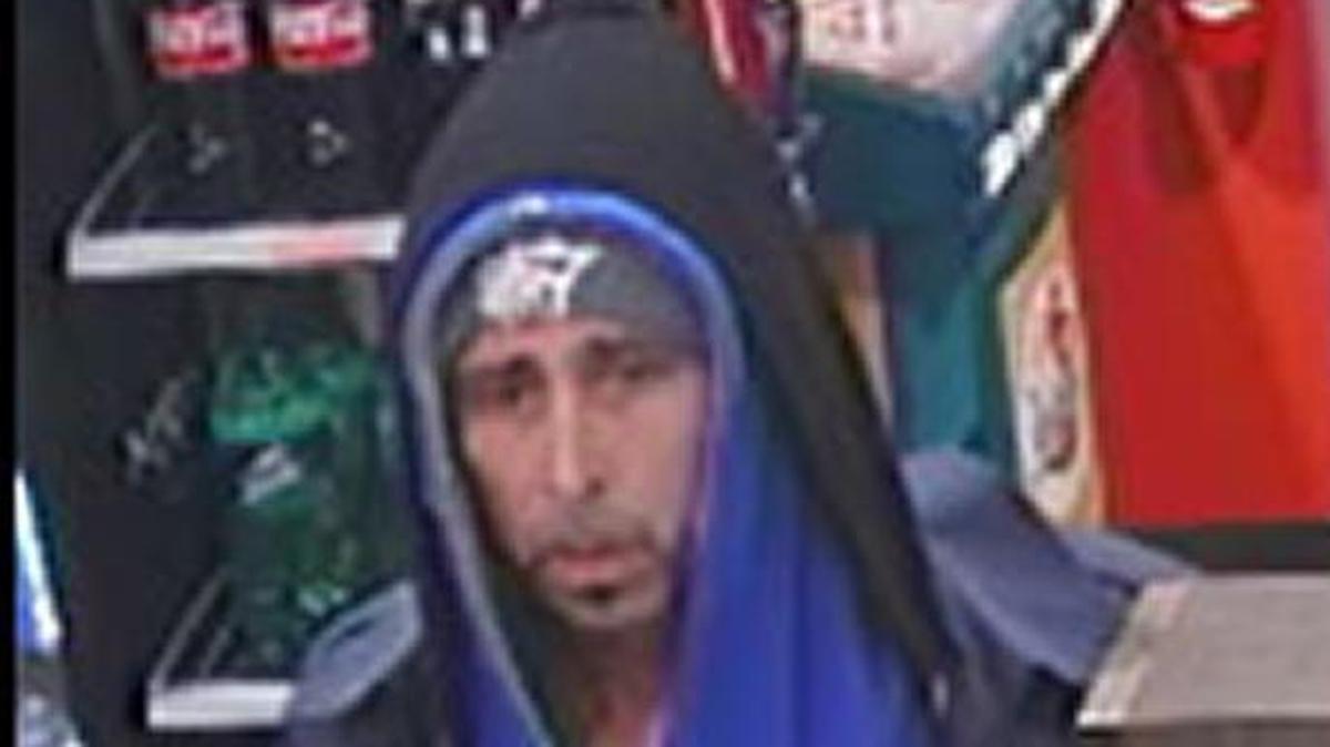 Authorities are looking for this man in connection to a pair of armed robberies early Sunday morning at Shell gas stations in Manatee County.