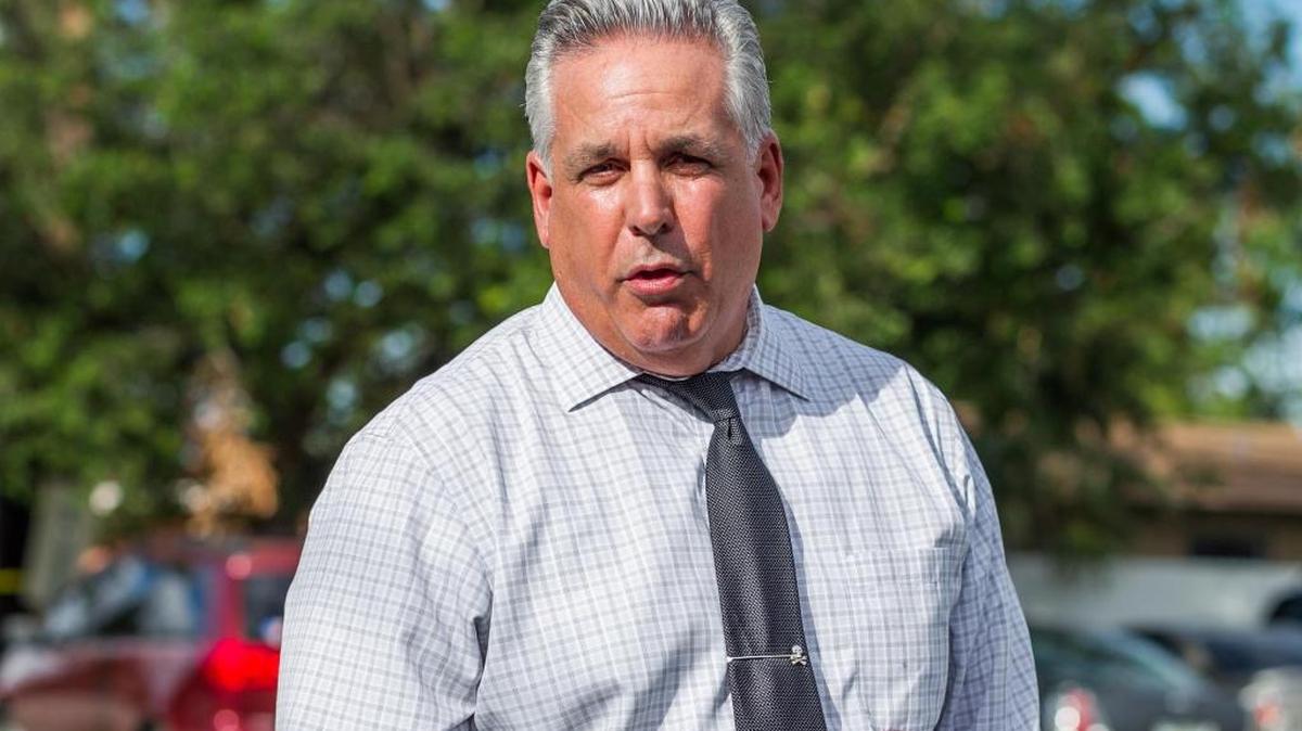 Miami-Dade Det. Lee Cowart speaks during a press briefing of a shooting involving two dead persons inside a car at Northwest 79th Street and Fifth Avenue in Miami on Oct. 18, 2017.
