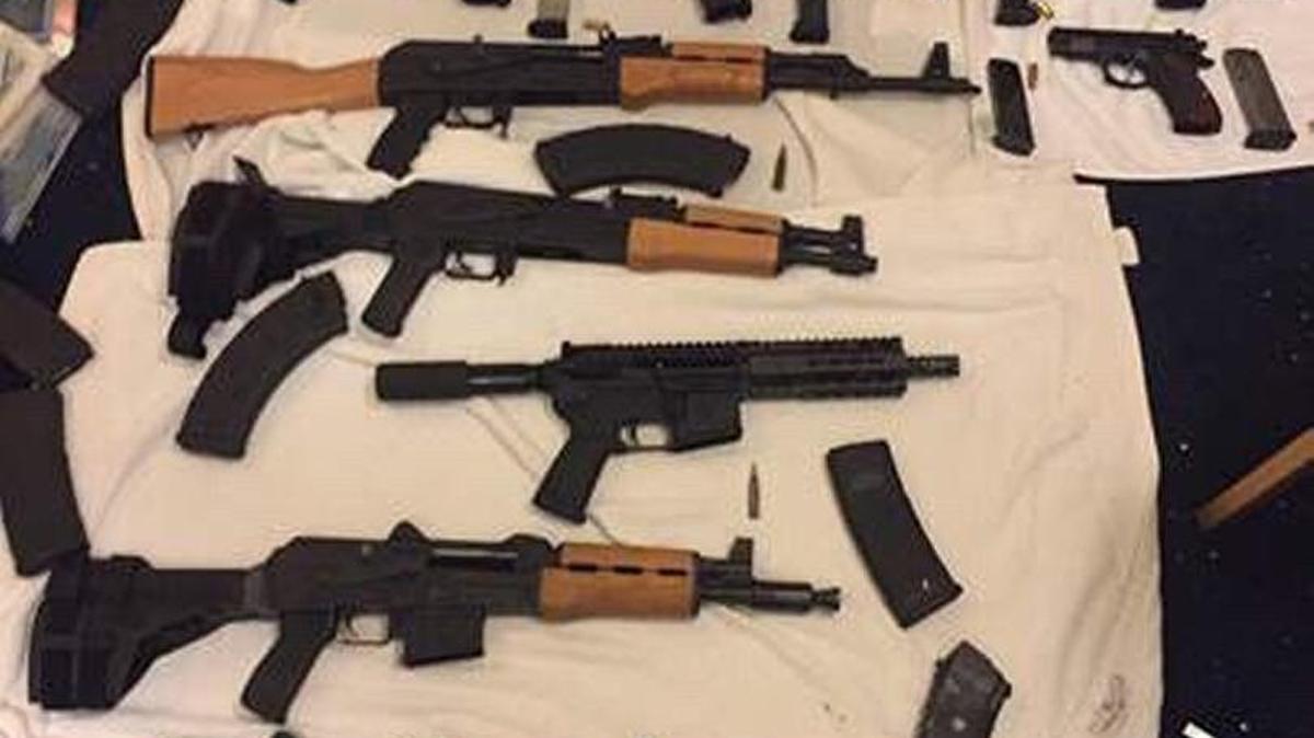 Weapons found by Miami Beach police inside the home of Ricky Weinberger, 54, who is accused of threatening officers.