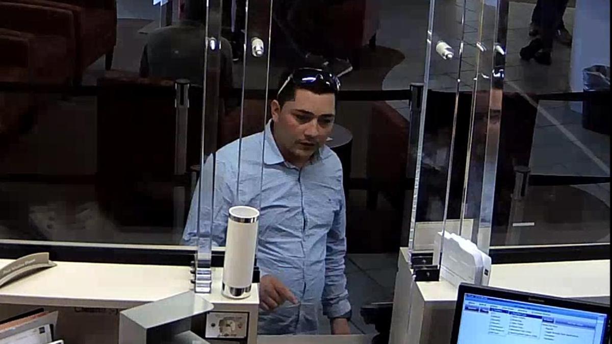 Police are looking for this man, who is believed to have pulled off a lottery scam and stolen $10,000. The picture was pulled from a video taken at a Wells Fargo bank in Southwest Miami-Dade.