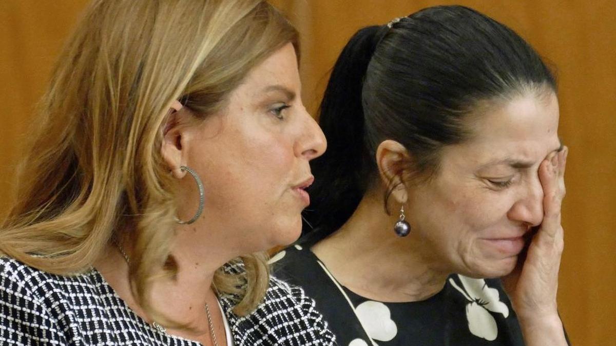 Motorist Marilyn Aguilera, right, loses her composure as her attorney Ana Davide, left, argues her case in court on Friday. A Miami-Dade judge cancelled a plea deal arrangement in a DUI crash that cost South Dade High School principal Javier Perez his legs.