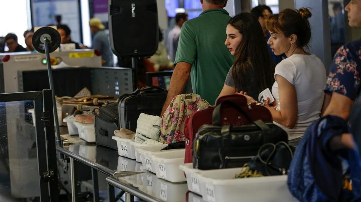 A passenger tried to bring a loaded gun in a carry-on at Orlando International Airport the day after Christmas, causing delays at security checkpoints, according to the Associated Press.