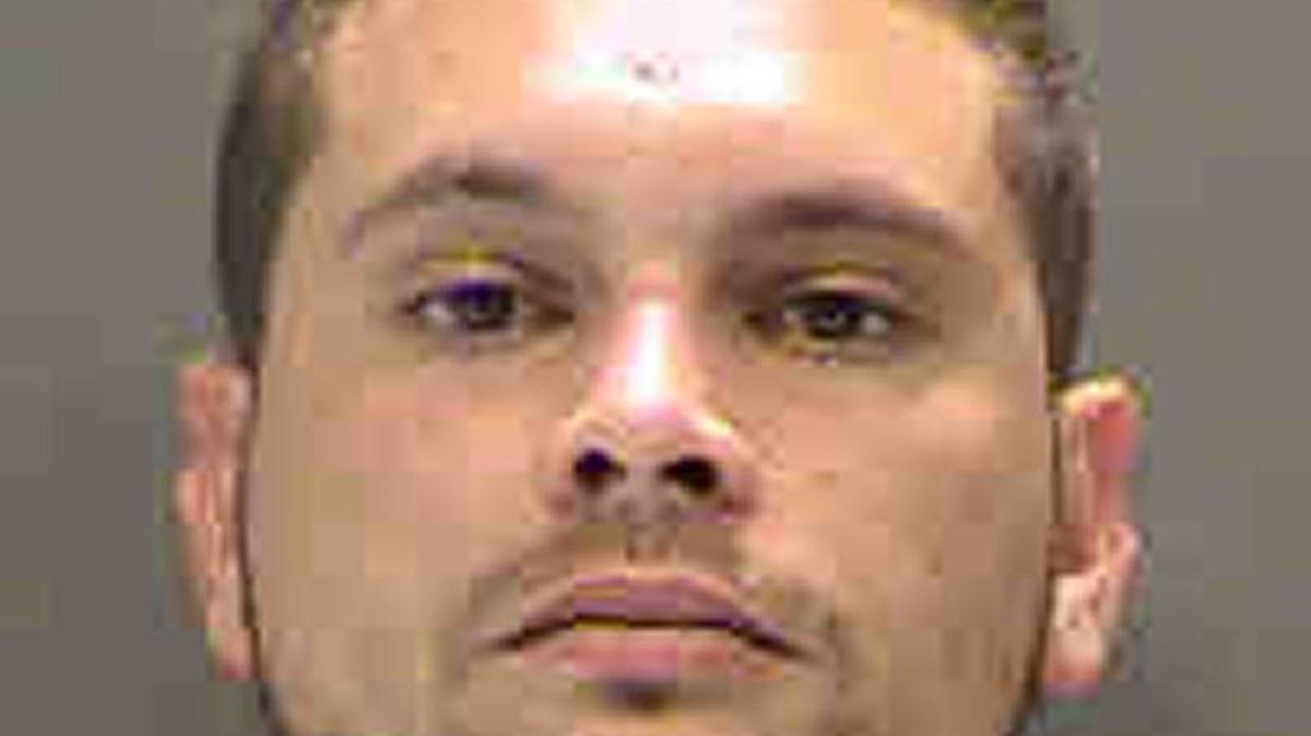 Christopher Banach, 26, was arrested Wednesday after a road rage incident.