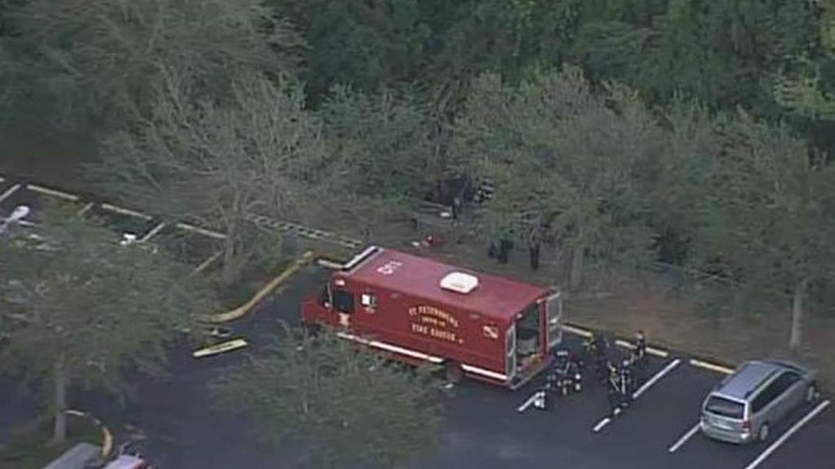 A St. Petersburg Fire Rescue truck on the scene in St. Petersburg where a body was found in a creek, Wednesday, Dec. 27, 2017. The case is being treated as a suspicious death.