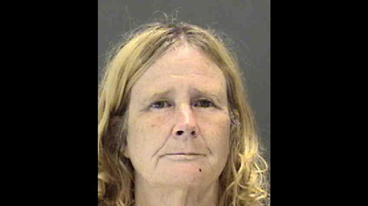 Amy Lovering, 53, faces two misdemeanor counts of cruelty to animals and one count of confinement without food or water. She is being held without bond and has two prior arrests for animal cruelty in Tennessee.