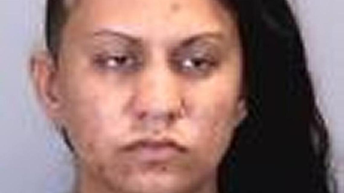 Candace Johnson, 31, is charged with burglary of an unoccupied dwelling during a state of emergency.