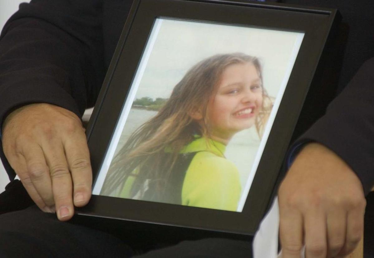 Joe Brucia, the father of Carlie Brucia, holding a picture of Carlie that was dropped off to the State Attorney’s office and give to him. Brucia read a statement to the jury during the first day of the sentencing stage of Joseph Smith. Smith was found guilty of the murder of Carlie Brucia.