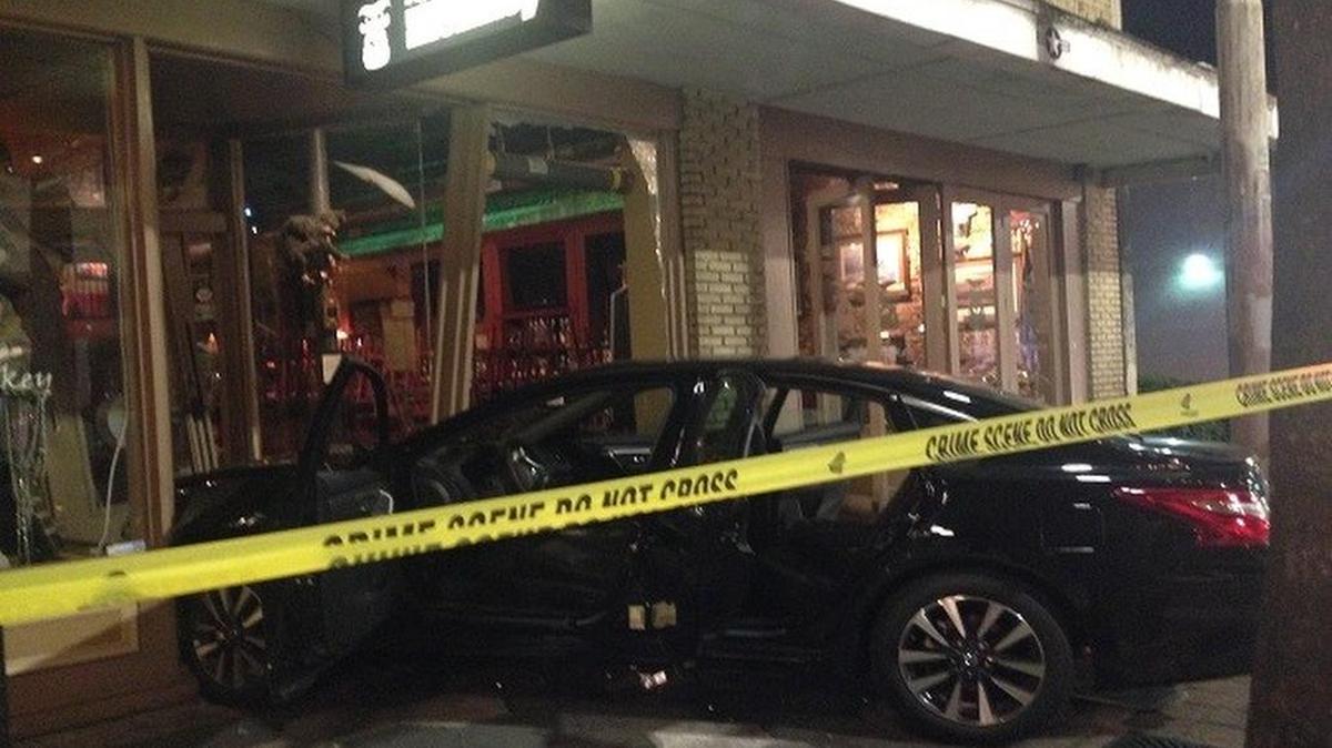 One man involved in the fight then got in his car and drove directly at one of the persons he was fighting, authorities said. The vehicle crashed into The Bad Monkey bar at 1717 East 7th Avenue. The driver of the car managed to leave the scene and is being sought.