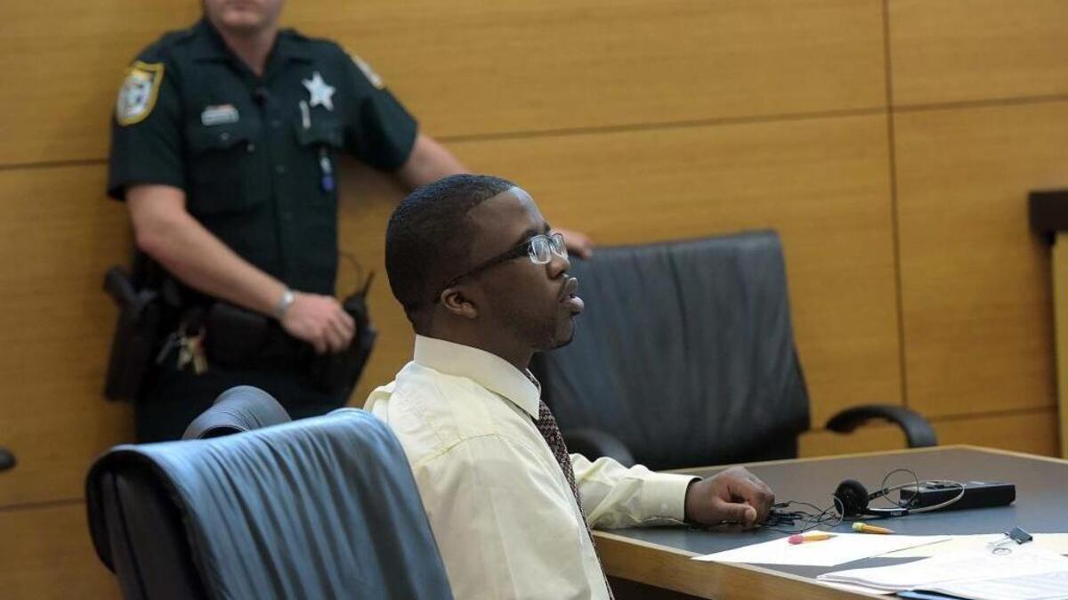 Defendant Tavaris Johnson, charged with second-degree murder with a firearm in the 2014 fatal shooting of Samuel Edwards, sits in court during his trial on Tuesday.