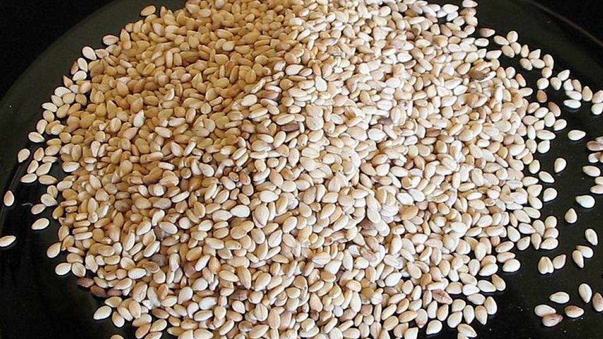 A naked burglary suspect was looking for sesame seeds, police said.