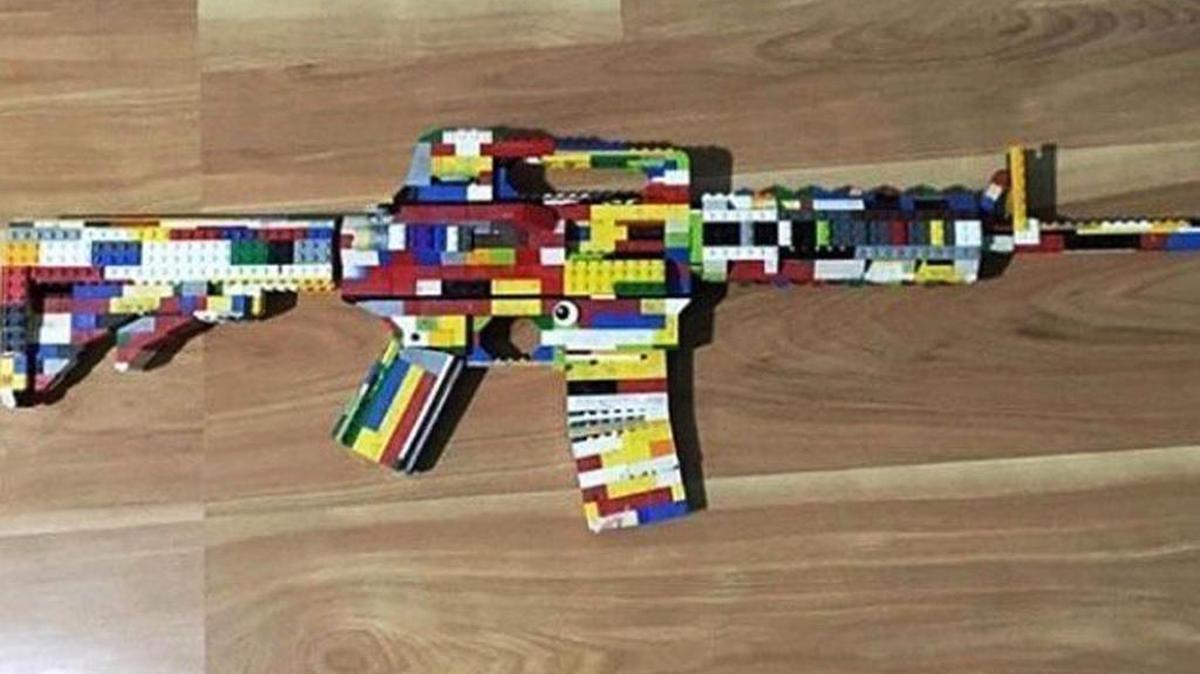 This photo provided by the San Diego County Sheriff's Office shows an AR-15 rifle made of Legos that authorities say a 14-year-old boy posted on Instagram, along with a threat against West Hills High School in Santee, California. The boy, a freshman at the school, was arrested Feb. 27, 2018, on suspicion of making terrorist threats.