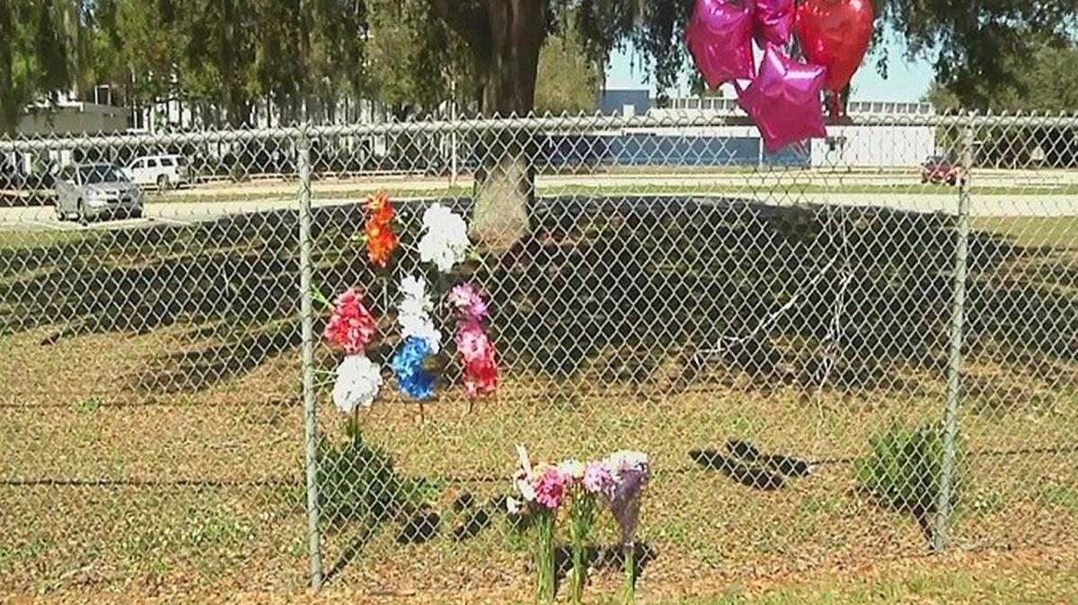 Lake Gibson Middle School, the workplace of two women who were shot and killed in their home Friday, had a memorial outside for assistant principal Samara Routenberg and 6th grade math teacher Lisa Fuillerat.