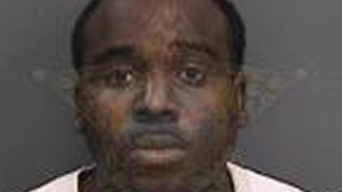Angel Calix, 26, is wanted for manslaughter. This photo is from a previous arrest.