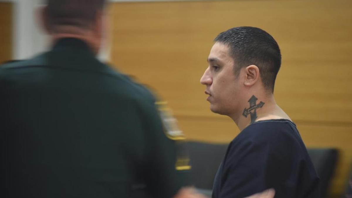 Andres “Andy” Avalos Jr. walks into the courtroom Wednesday to be sentenced by Judge Diana Moreland to three consecutive life terms in prison.