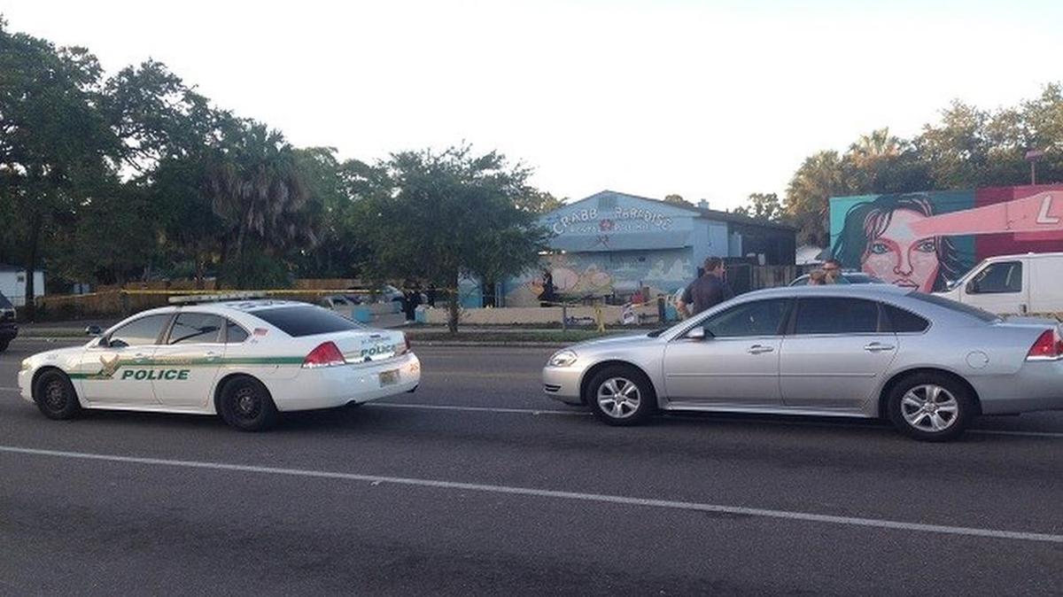 Police investigate a fatal shooting outside a pool hall near 18th Avenue South and 31st Street South in St. Petersburg.