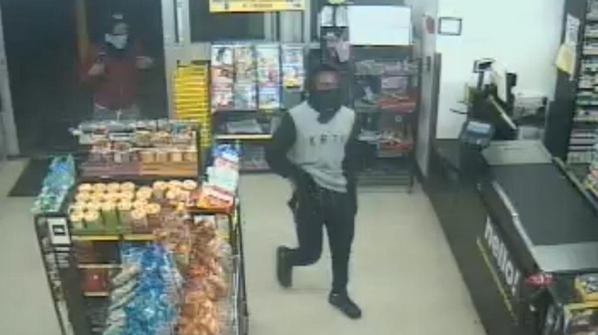 Surveillance camera footage of one of the suspects accused of armed robbery at a Dollar General Tuesday.
