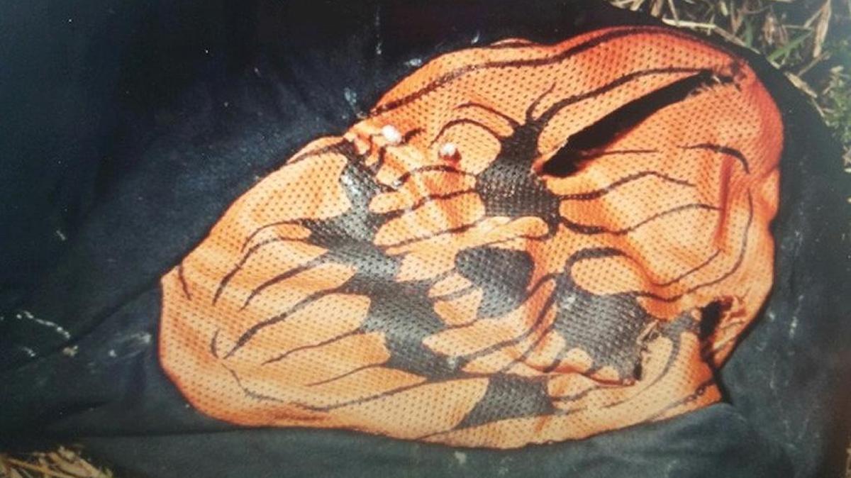 The carjacking suspect was seen wearing this orange Halloween mask.