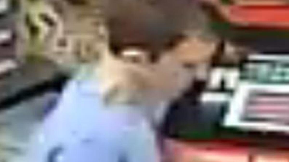 This surveillance video screenshot shows the suspect in the case of an Aug. 13 vehicle burglary.