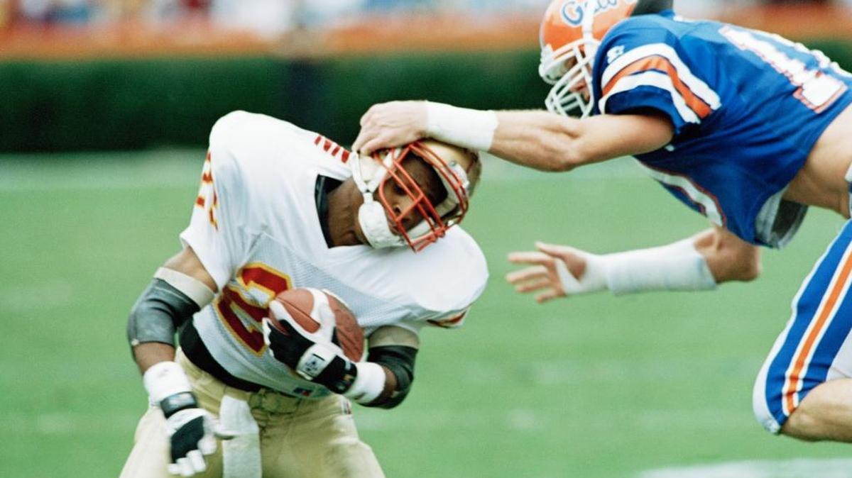UF’s Monty Grow, right, on the field in 1993.