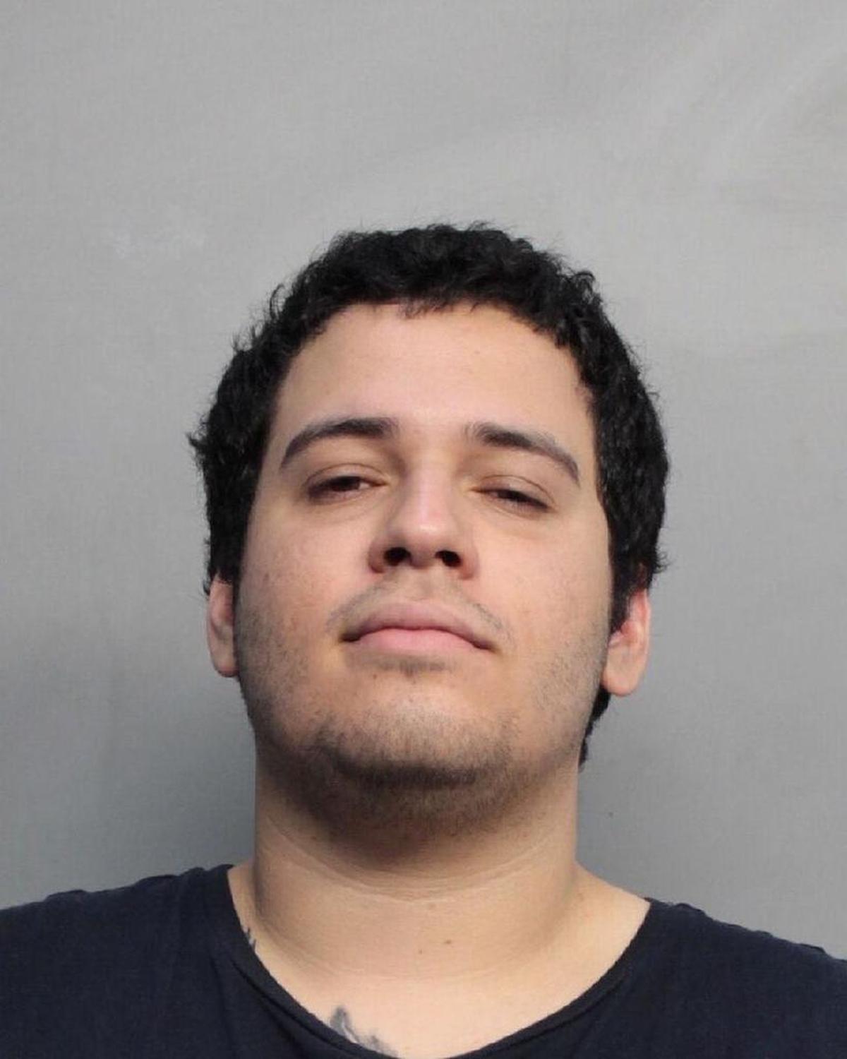 Enrique Santana, 20, was charged with attempted murder and aggravated battery after a standoff at a Kendall Burger King in which police said he and a friend tried to videotape themselves harassing employees.