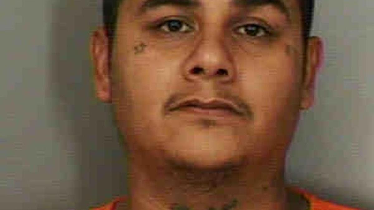 Investigators said John Lugo, 29, of Lakeland, fired shots at those inside a vehicle and issued a warrant for his arrest for possession of a firearm by a convicted felon.
