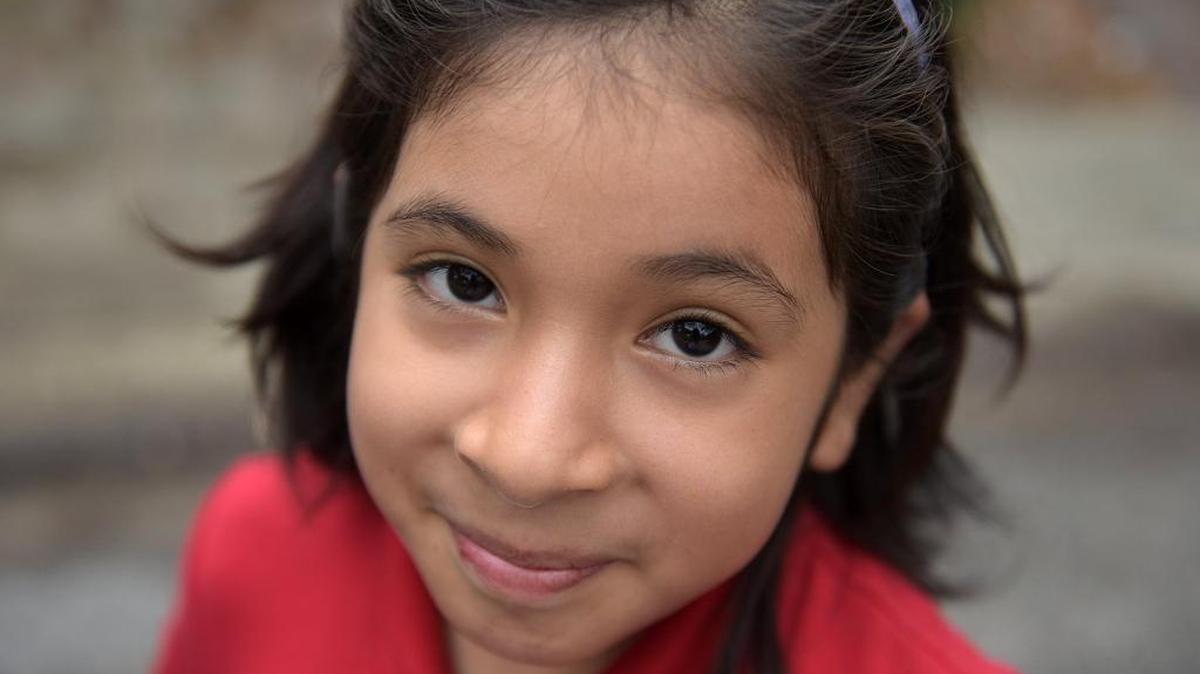 Madian Luna, 8, in the road in front of her Bradenton home. Now that Donald Trump is president-elect of the United States, some children of undocumented immigrants in Manatee County express their fears associated with the future of their families.