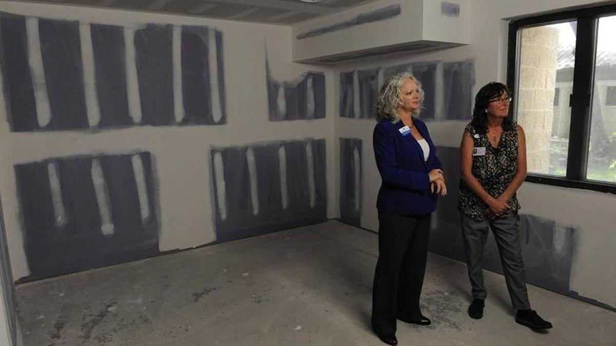Centerstone executives Melissa Larkin-Skinner and Michelle Abercrombie show one of the new bedrooms under construction in June 2016 as part of the renovation of a 2,700-square-foot psychiatric unit at 2020 26th Ave. E. in Bradenton.