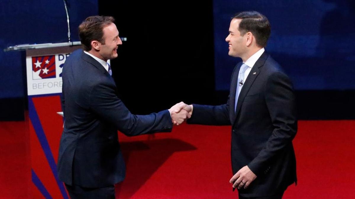 Rep. Patrick Murphy, left, and Sen. Marco Rubio shake hands before the start of Wednesday night’s debate at Broward College in Davie. Rubio and Murphy held their second and final debate, 13 days before the election.