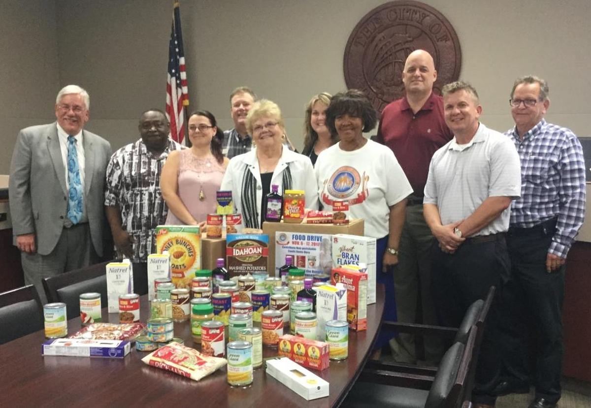 The Palmetto City Commission and staff celebrates the kick off to the annual Mayors’ Feed the Hungry Thanksgiving food drive, which began Nov. 6 and will last until Nov. 17.