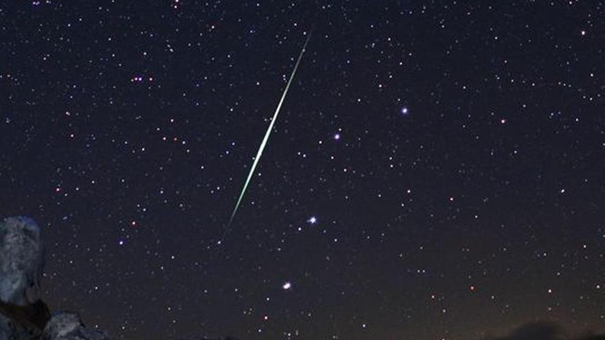 A Geminid fireball explodes over the Mojave Desert.