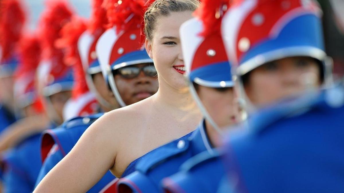 Manatee High School’s marching band takes to the field for a game against Lincoln High at Kinnan Field.