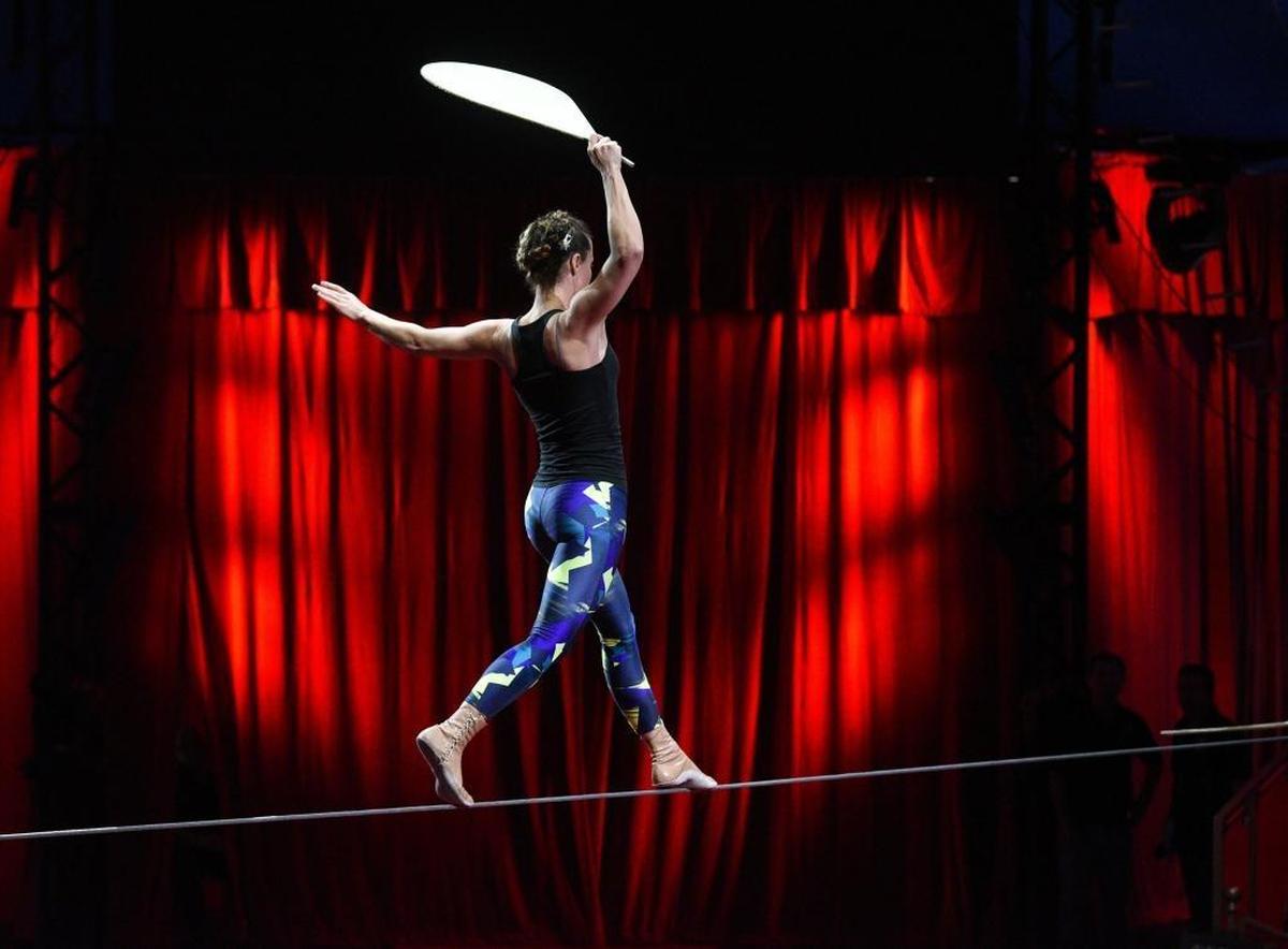 Julia Figuiere practices her tight rope act during a rehearsal of Circus Sarasota's show Tuesday. The performances are set to open Friday in the tent behind the UTC Mall.