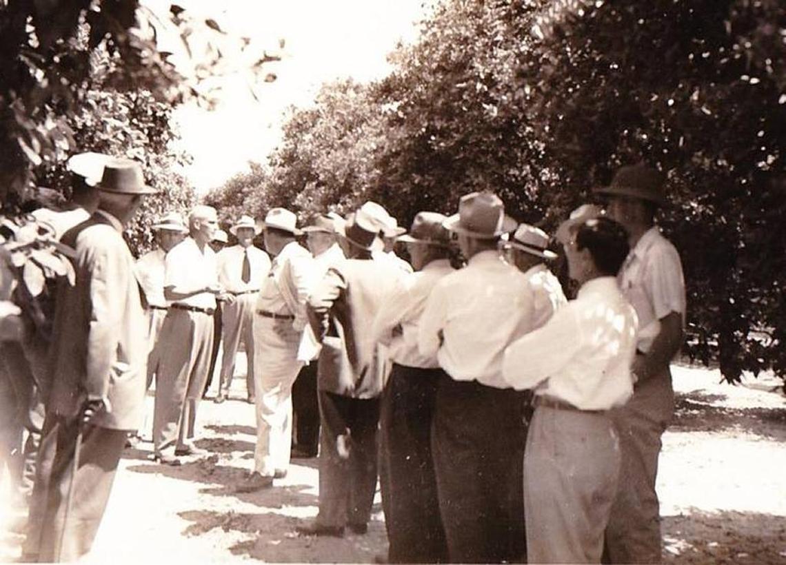 Frank Connor leads a tour of visiting railroad agricultural agents in Manatee County. Connor has been honored by the city of Palmetto, which named a new park after the railroad legend.