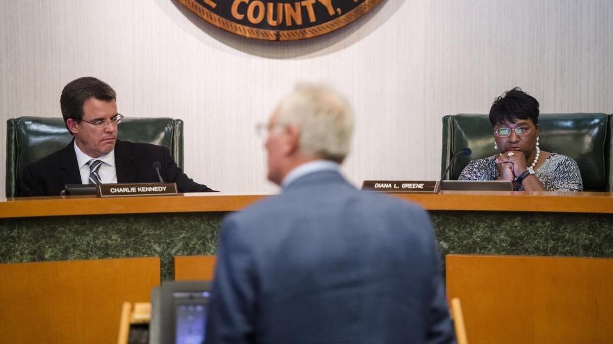 Manatee County School Board Chairman Charlie Kennedy and Superintendent Dr. Diana Greene listen to public comment during Tuesday’s meeting.