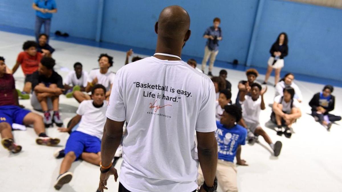 Former NBA All-Star Kenny Anderson speaks to students at the DeSoto Boys and Girls Club on Friday.