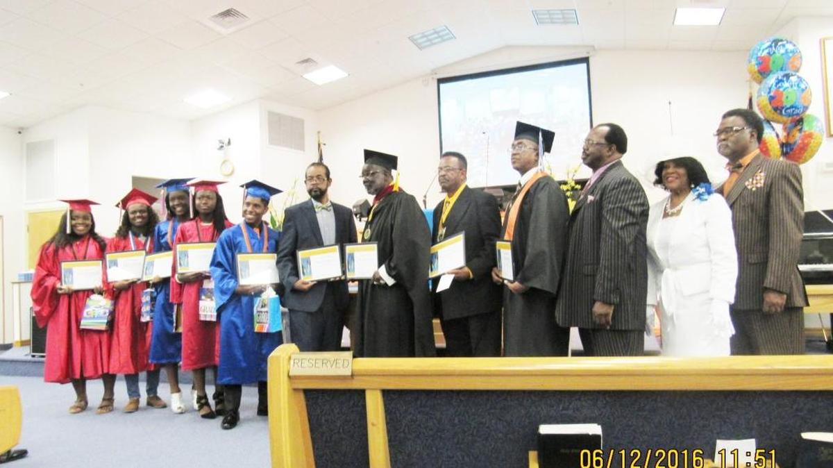 Graduates pose for a photo at St. Paul