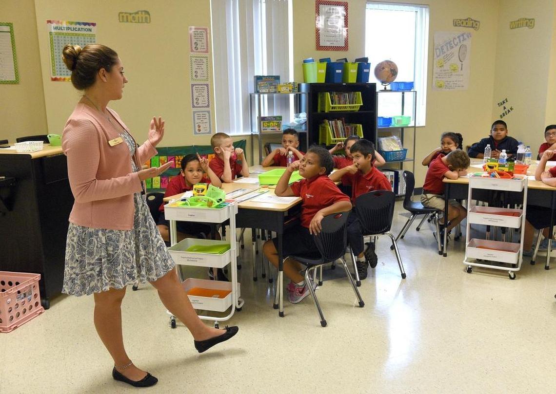 Third-grade teacher Emma Rafidi talks to her students at Manatee Charter School Thursday where new leaders attempt to change the culture of a school that the School District of Manatee County has threatened to shut down.