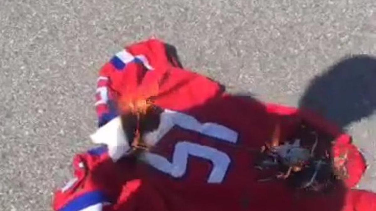 A photo of a burning Manatee High School jersey began circulating online Monday night after the football game.