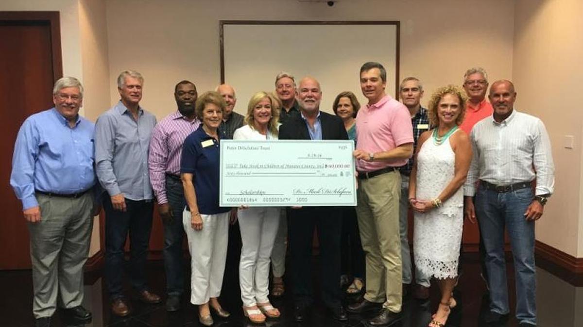 The Take Stock in Children of Manatee County board recently accepted a donation from Mark DiSclafani, a local doctor.