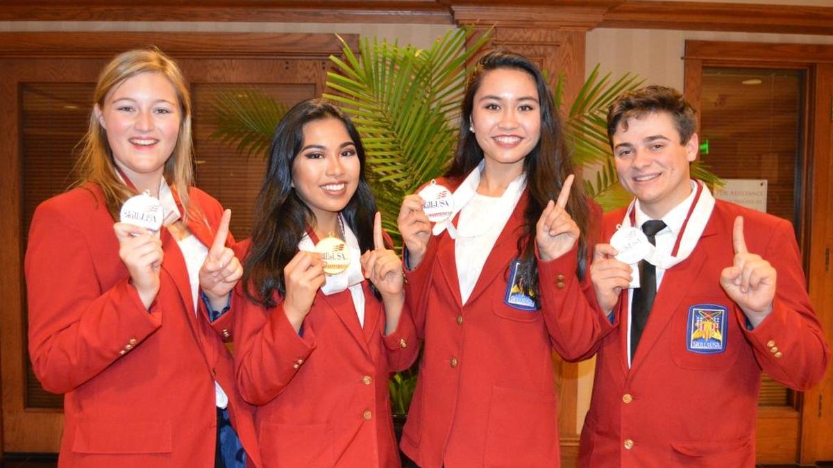 Southeast High School students who competed in the broadcast news competition pose for a photo.