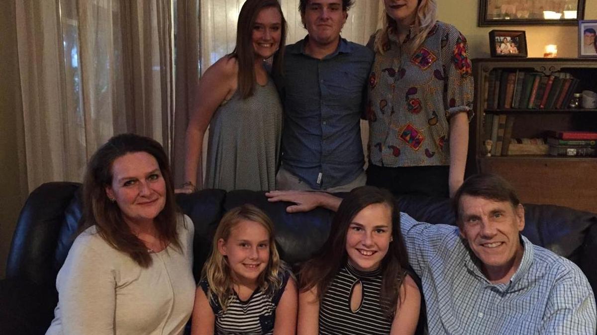 A child from the Fuchs family has attended Stewart Elementary for the last 19 years in a row. Back row, left to right: Kate, 15, Christian, 20, Emily, 25. From row, left to right: Trisha, 50, Claire, 9, Ella, 12, Don, 60.