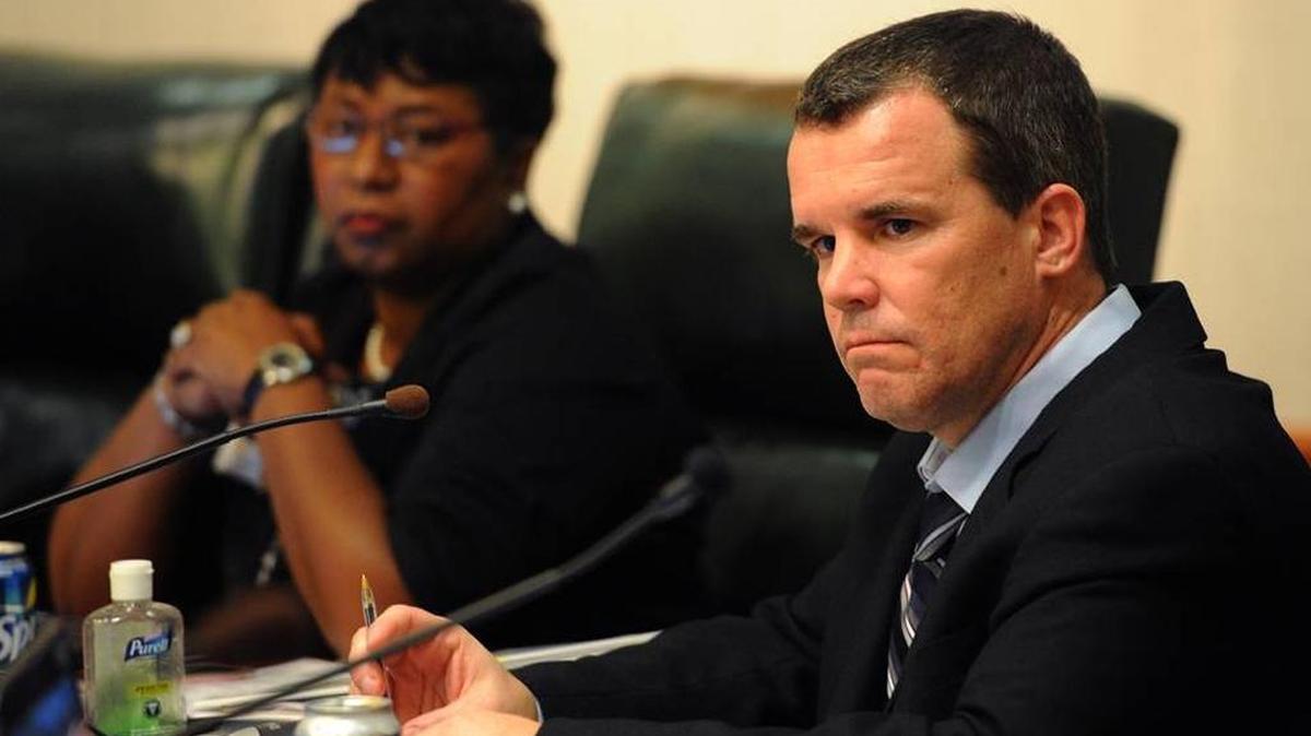 In this file photo, Manatee County School Superintendent Diana Greene and School Board member Charlie Kennedy listen to an audit committee report. Kennedy is advocating for a change to how school board members in Manatee County are elected.
