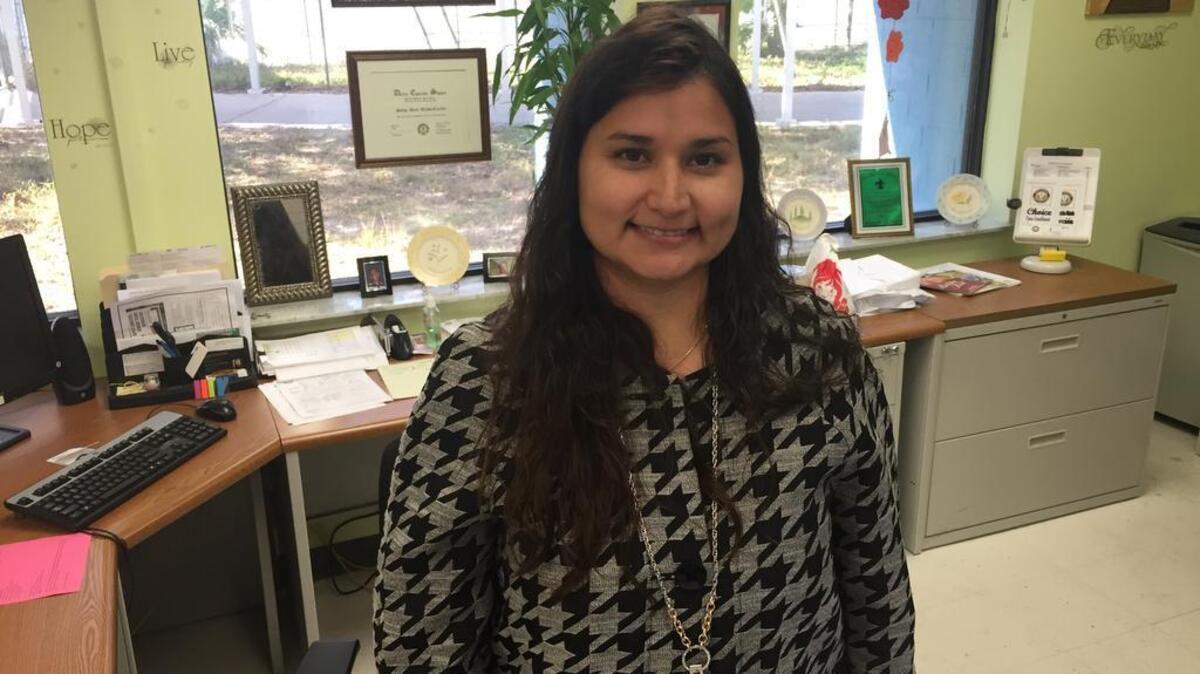 Alicia Carrillo, school choice specialist with the School District of Manatee County, mans her desk on the first day of open enrollment.