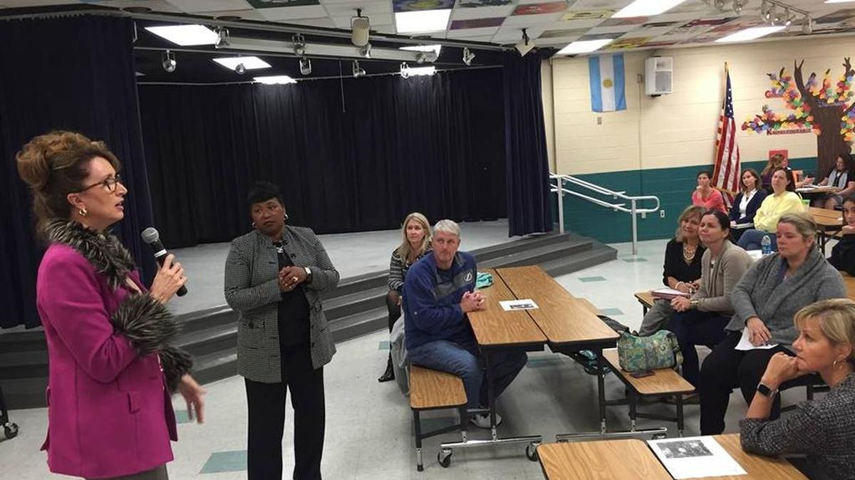 In this file photo, Deputy Superintendent of Instruction Cynthia Saunders answers parent questions at Wakeland Elementary School. On Monday, Saunders will deliver a presentation on Charter Schools at the League of Women Voters.