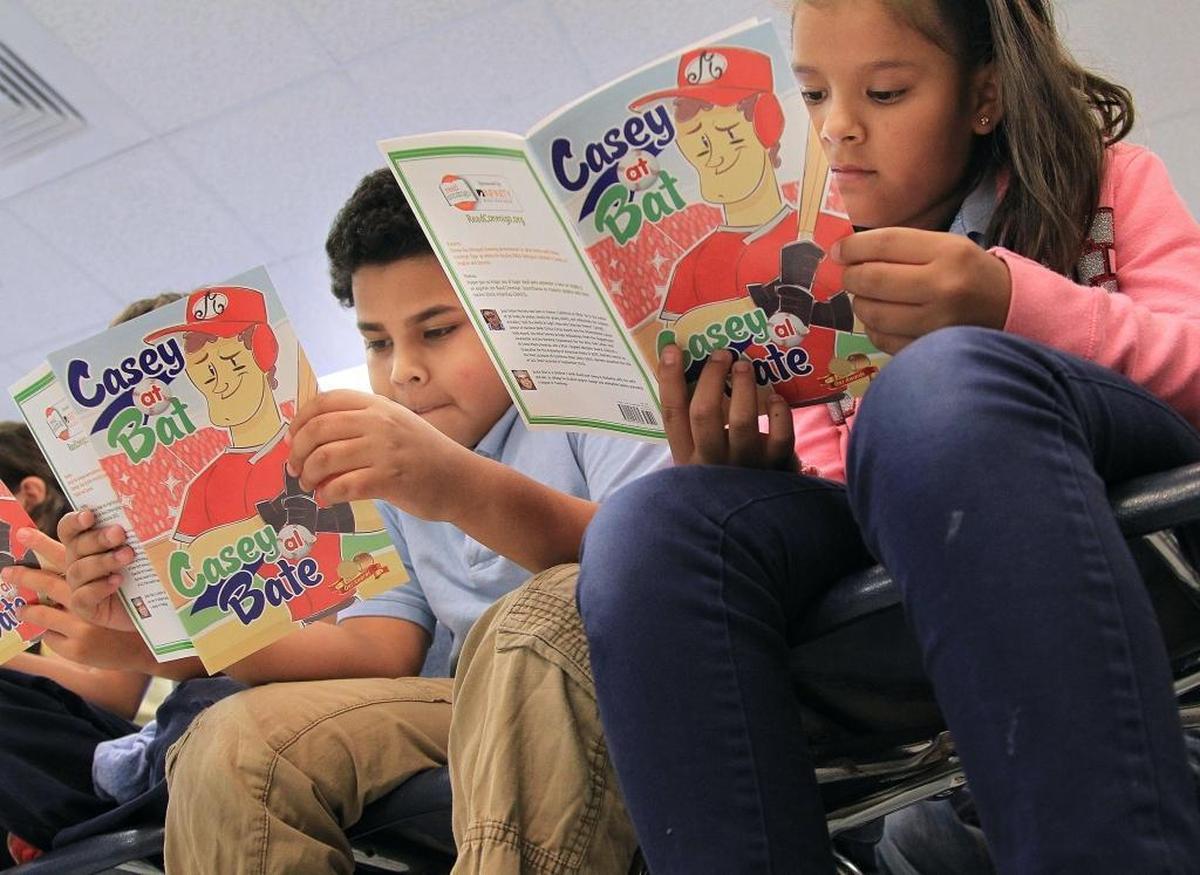 Fourth-grade students read at Kensington Park Elementary in Miami on Tuesday, May 10, 2016. The federal tax overhaul could impact the amount of money available for public education.