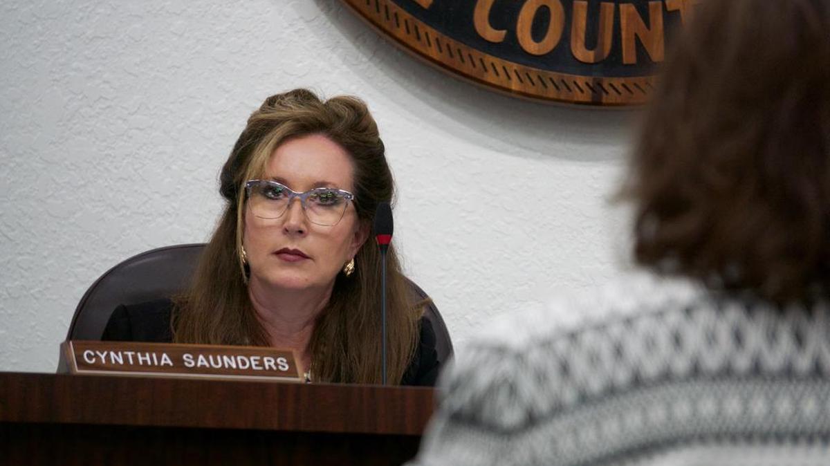 Superintendent Cynthia Saunders listens to recommendations by Andrea Messina, executive director of the Florida School Boards Association. The board discussed a search for its permanent superintendent on Tuesday evening.