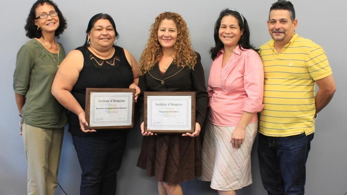 Pictured left to right are Andrea Gonzalez, Mary Ann Guerrero, Esperanza Gamboa, Maria Matute, and Jose Cordovez (missing from the photo is Carolina Betancourt).