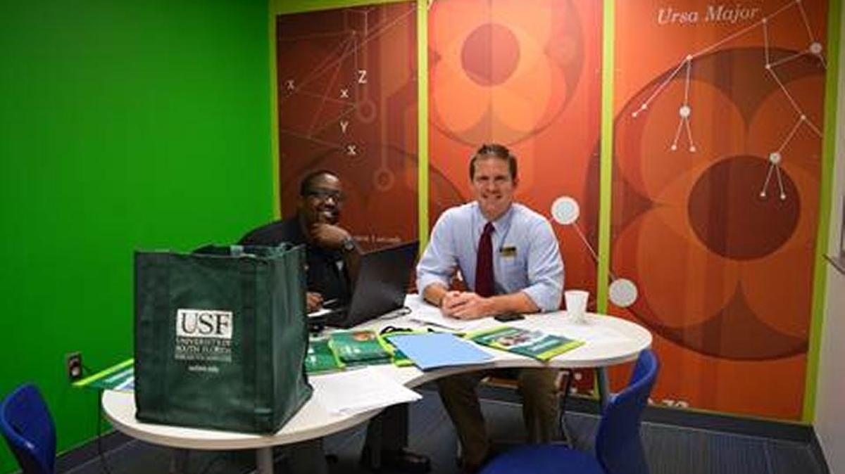 Brandon Avery, Assistant Director of Admissions at USFSM and Andy Telatovich, Director of Admissions & Financial Aid at USFSM reviewed applications at the Collegiate School during Instant Decision Days.