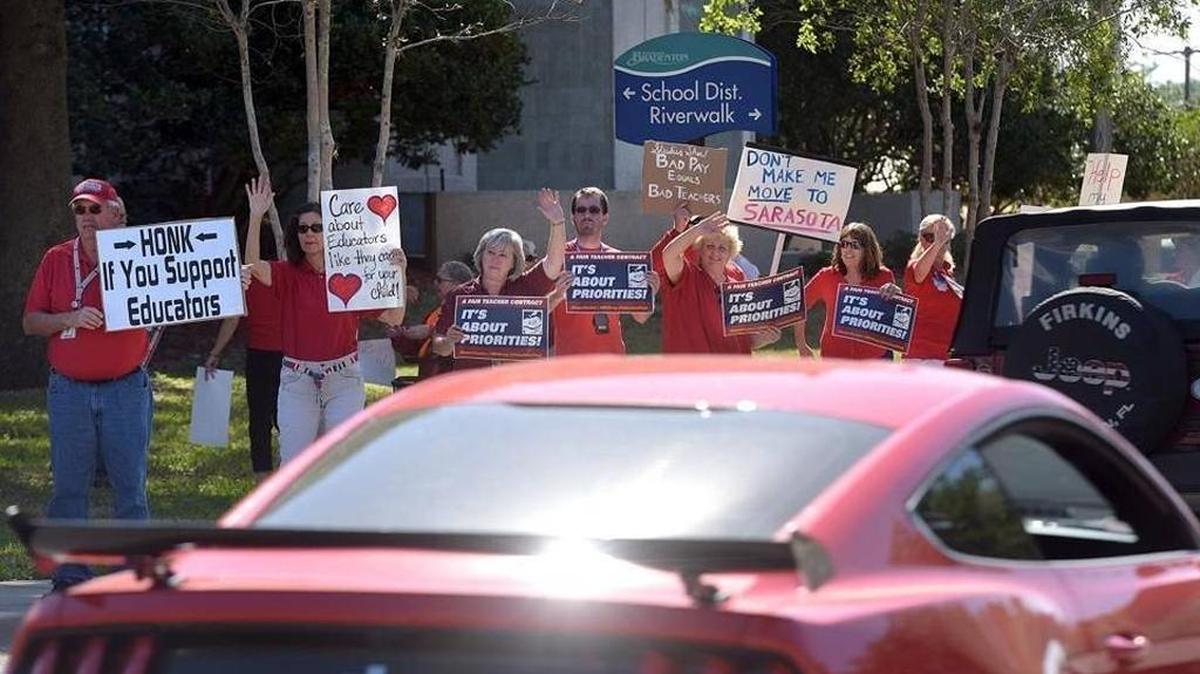 Teachers rallied on March 27 outside the Manatee School District’s administration building on Manatee Avenue West in Bradenton. Many complained that they’ve seen their salaries decrease over the years.