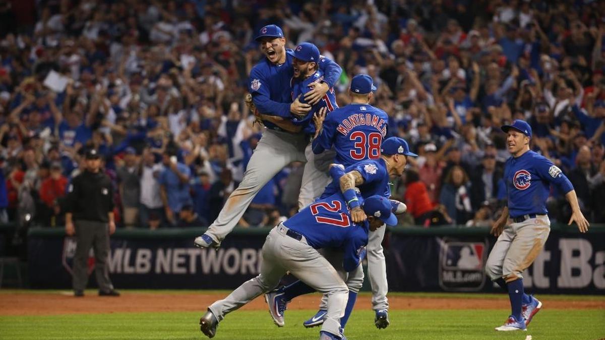 The Chicago Cubs celebrate after defeating the Cleveland Indians in Game 7 to win the World Series 8-7 at Progressive Field in Cleveland.